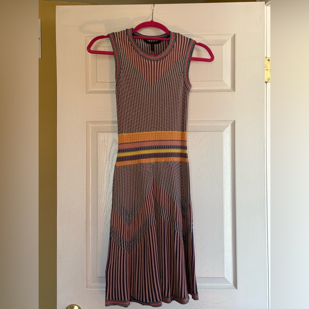 Beautiful light sweater colorful BCBG fit and flair dress.